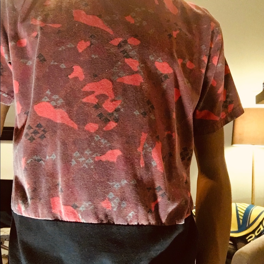 Slightly worn red shirt with black bottom